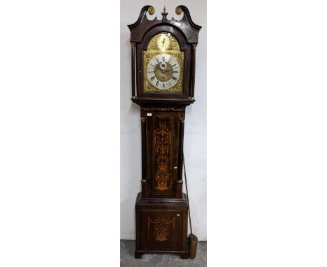 A George III mahogany musical longcase clock, the case having a broken swan neck pediment, marquetry inlaid and Corinthian co