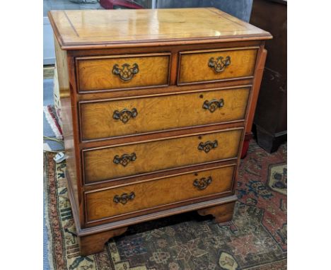 A late 20th century elm finished chest of two short and three long drawers on bracket feet, 74cm h x 60.5cm wLocation:BWR 