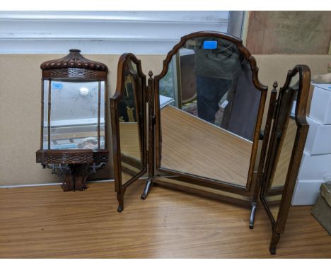 An 18th century style mahogany wall shelf mirror in the Chinese pagoda style decorated with blind fretwork and gadrooning rec