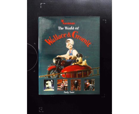 The World Of Wallace And Gromit hardback book by Andy Lane. Published 2004 Boxtree First Edition ISBN 0 7522 1558 2. 184 page