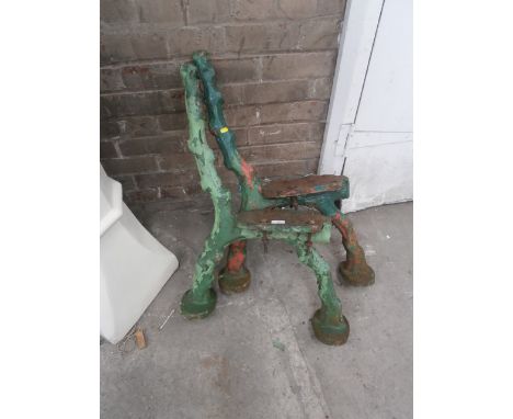 pair of vintage cast iron bench ends