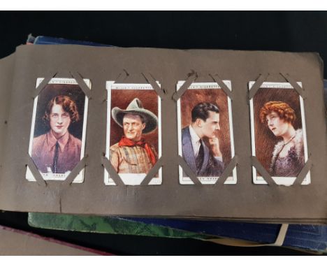 4 ALBUMS OF CIGARETTE CARDS 