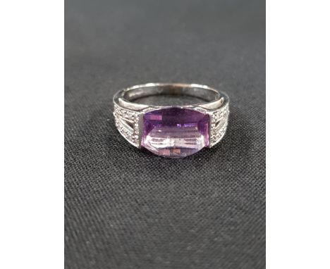 9 CARAT WHITE GOLD DIAMOND AND AMETHYST RING 