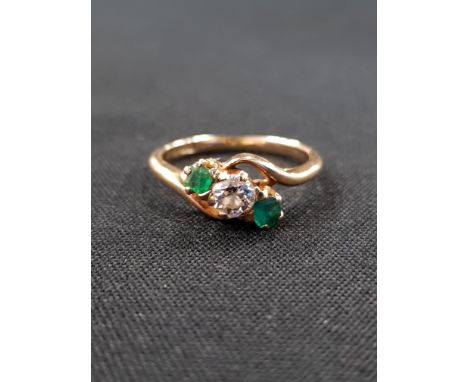 18 CARAT EMERALD AND DIAMOND RING 