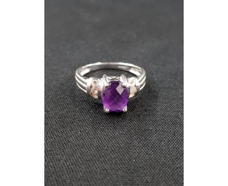 9 CARAT GOLD AMETHYST RING