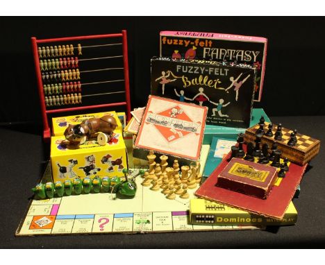 Toys and Juvenalia - a Pelham puppet, Caterpillar, boxed; another, Bengo; a mid 20th century Monopoly game; wooden chess piec