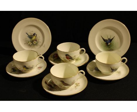 Two sets of Royal Worcester ornithological teacups, saucers, and tea plates, Swallow and Blue Tit, painted by William Powell,