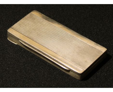 An Art Deco silver vanity case, hinged cover enclosing a make-up mirror, two powder compact compartments and a lipstick holde