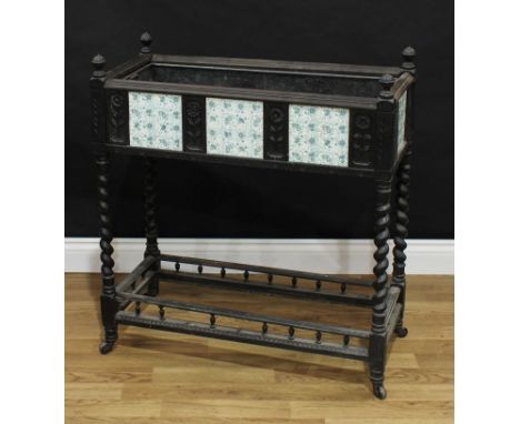 An Aesthetic Movement ebonised flower trough/planter, rectangular top with urnular finials set with six ceramic tiles, with t