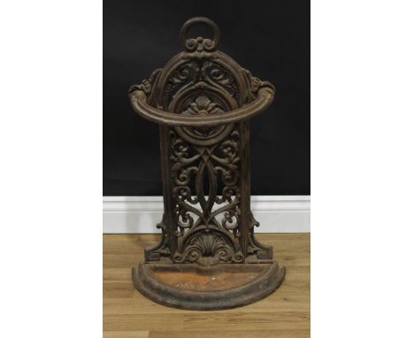 A Coalbrookdale style cast iron walking stick or umbrella stand, cast throughout with scrolling foliage and a stylised flower