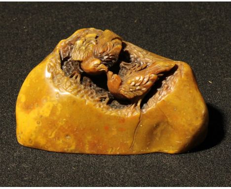 A Chinese soapstone scroll weight, 9cm long 