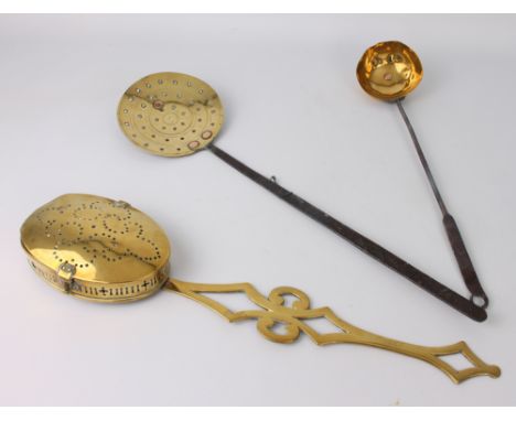 Three 19th century brass kitchen and fireside implements - comprising a brass chestnut roaster, with lockable oval pan and pi