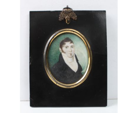 English School (19th century): a portrait miniature of a gentleman - oval, watercolour on ivory, wearing a black coat and whi