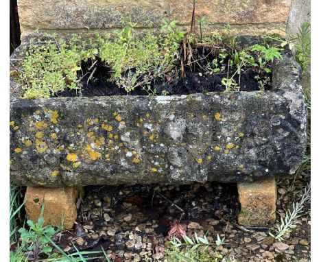 A composite stone rectangular trough-style planter - 69 x 39cm, 23cm high.