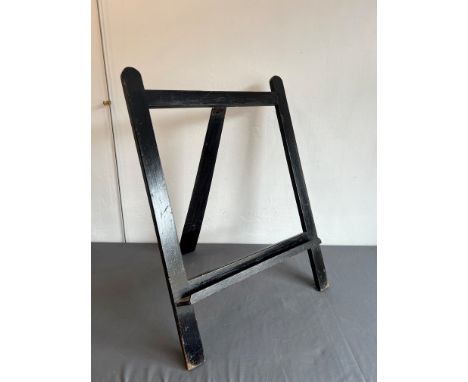 A small ebonised oak artist's or picture easel - early 20th century, 71 cm wide, 52 cm high.