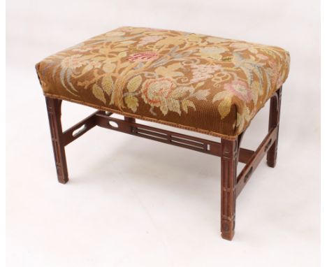 A George III style carved beech wood blind fret carved stool - 19th century, the rectangular stool with tapestry seat decorat