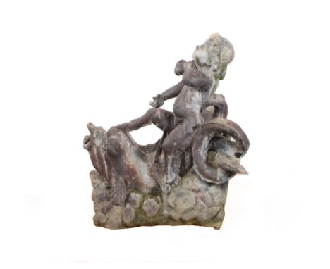 A Georgian lead cherub and dolphin fountain - 77.5 cm high, 66 cm long, 51 cm wide at rear, some losses.* Condition: Good ori