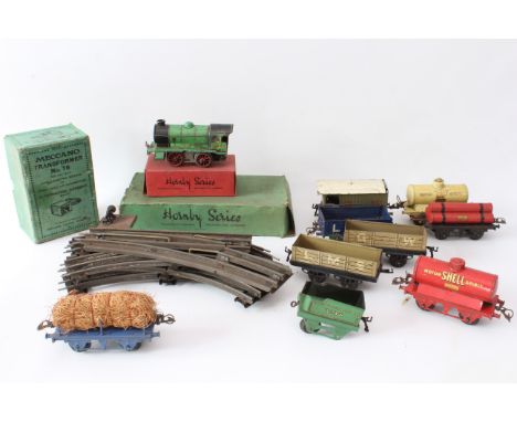 A quantity of early 20th century Hornby and Meccano train rolling stock including Track Shell Motor Spirit tanker and a BP Sp