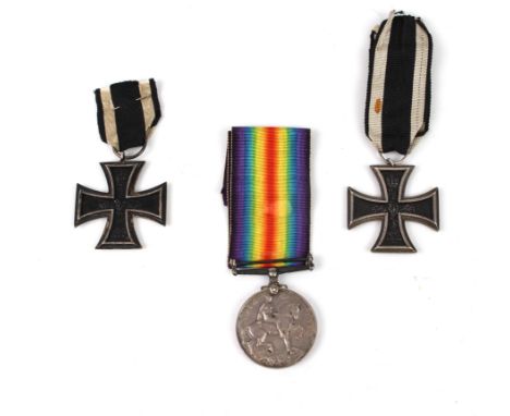 The British War Medal to 70886 PTE. J.W.D. YOUNG, DEVON. R. and two Iron Crosses