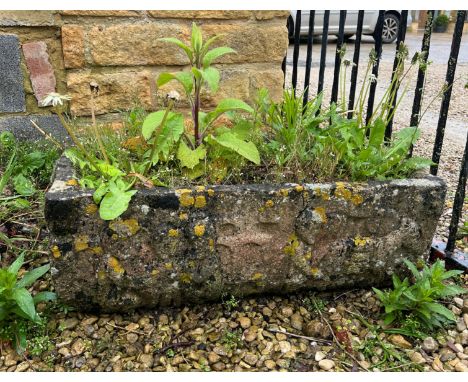 A composite stone rectangular trough - decorated with a figural frieze, 70 x 35cm x 23cm high.  