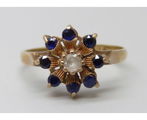 A 9ct gold, sapphire and white stone cluster ring, 1.9g, K/L