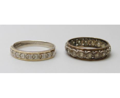 A 9ct gold and silver ring, N, and an unmarked eternity ring, J/K, 3.9g total