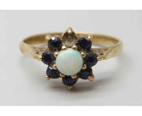 A 9ct gold, opal and sapphire ring, one stone missing, 1.8g, L
