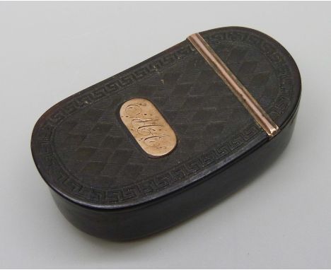 An early 19th Century tortoiseshell snuff box with etched Greek key design border and yellow metal mounts and monogram, 5.6 x