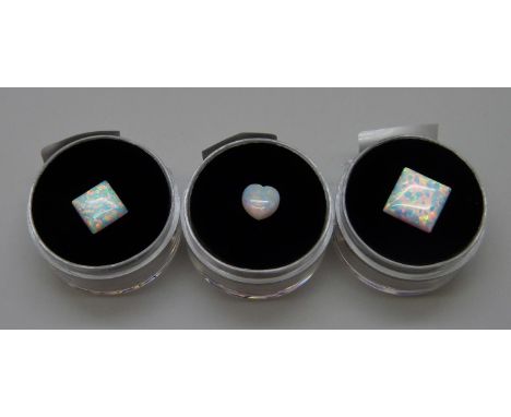 An opal heart and two opalite square stones 