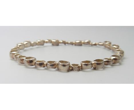 A handmade silver bangle by Cavandish French, 16.6g