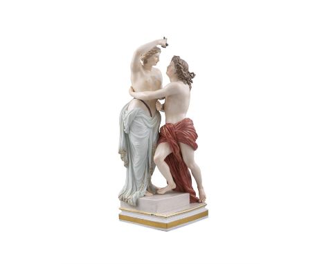A 19TH CENTURY MEISSEN PAINTED PORCELAIN STANDING GROUP OF HERO AND LEANDER BY CHRISTIAN GOTTFRIED JUECHTZER on stepped squar
