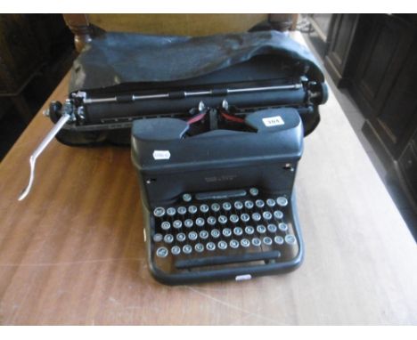 LC. SMITH AND CORONA TYPEWRITER- WITH COVER