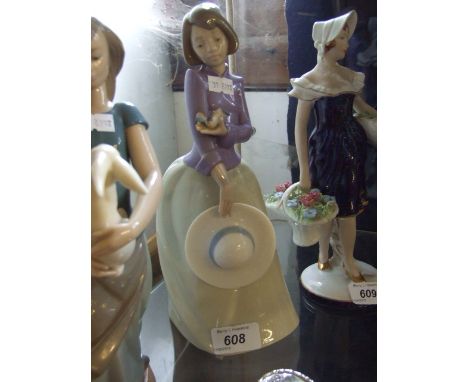 NAO FIGURE OF GIRL WITH BIRD 