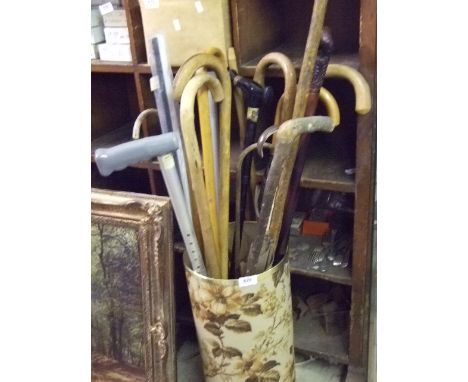 UMBRELLA STAND AND CONTENTS OF WALKING STICKS, UMBRELLAS, INC KIWI CARVED STICK 