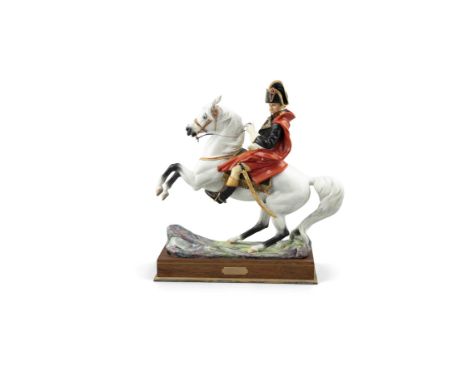A ROYAL WORCESTER PORCELAIN MODEL OF NAPOLEON BONAPARTE, modelled by Bernard Winskill, model no.126/750, set into a walnut an