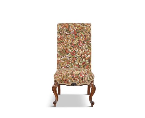 A VICTORIAN WALNUT FRAMED LOW SEAT SIDE CHAIR, with upholstered panel back and seat, covered in tapestry cloth and raised on 