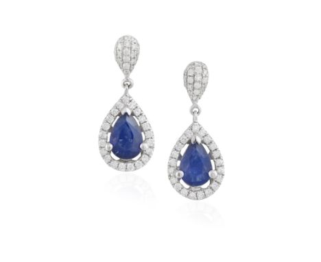 A PAIR OF SAPPHIRE AND DIAMOND PENDENT EARRINGS, each pear-shaped sapphire within a surround of brilliant-cut diamonds, suspe