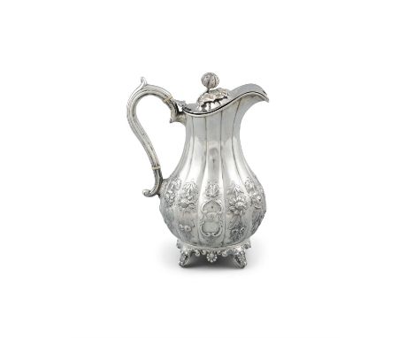 AN IRISH VICTORIAN SILVER HOT WATER POT, Dublin c.1896, maker's mark of John Smyth, of lobed baluster form, the hinged top wi