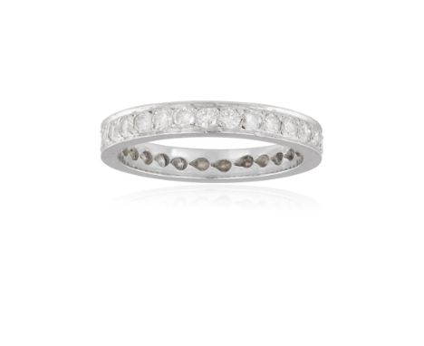 A DIAMOND ETERNITY RING, composed of continuous line of brilliant-cut diamonds within claw-setting, mounted in 18K gold, Fren