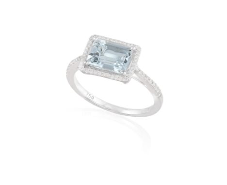 AN AQUAMARINE AND DIAMOND DRESS RING, the rectangular aquamarine within a surround pave-set with brilliant-cut diamonds and s