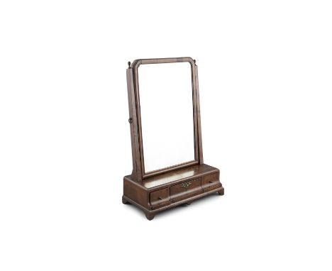 A GEORGE I WALNUT TOLIET MIRROR, c.1720, fitted with rectangular adjustable plate, with rounded upper corners, supported betw