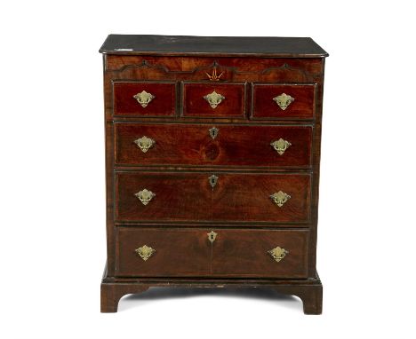 AN INLAID WALNUT RECTANGULAR CHEST, in the mid-Georgian taste, the crossbanded top with moulded rim above a decorative frieze