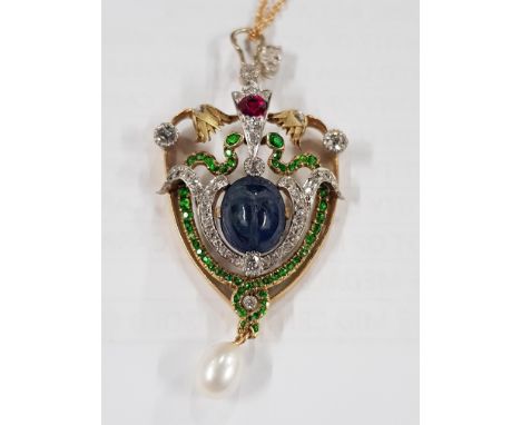 EXQUISITE 18 CARAT YELLOW GOLD EGYPTIAN SCARAB PENDANT AND CHAIN - CENTRE SCARAB CARVED SAPPHIRE ADORNED WITH SCROLLS OF ROSE