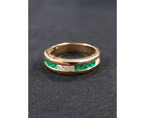 18 CARAT YELLOW GOLD EMERALD AND DIAMOND CHANNEL SET RING - CHANNEL SET ETERNITY STYLE RING SET WITH 8 PRINCESS CUT EMERALDS 