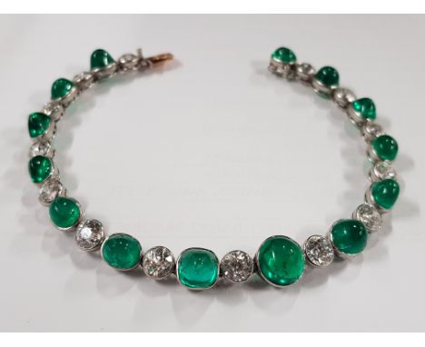 PLATINUM &amp; 18 CARAT GOLD FRENCH DIAMOND &amp; EMERALD BRACELET DATING TO CIRCA 1920-1930'S. THERE ARE 14 COLOMBIAN EMERAL