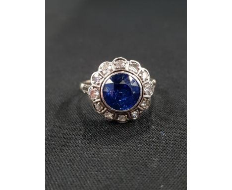 9 CARAT WHITE GOLD SAPPHIRE AND DIAMOND CLUSTER RING - CENTRE SAPPHIRE SURROUNDED WITH 12 ROSE CUT DIAMONDS ALL SET IN RUBOVE