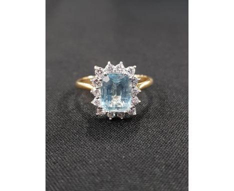 18 CARAT YELLOW GOLD AQUAMARINE AND DIAMOND RING 