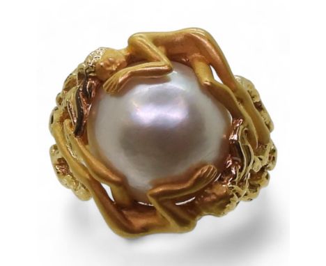 A CARRERA Y CARRERA PEARL RING the mount in the shape of two maidens holding a mabe pearl, with CC makers stamp and Edinburgh