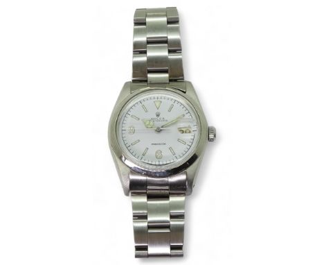 A ROLEX OYSTER DATE PRECISION in stainless steel, with a shiny polished bezel and brushed texture to the lugs and oyster stra