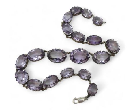 AN AMETHYST RIVIERA NECKLACE the amethysts taper in size from 21.7mm x 16.5mm to 12.9mm x 9.7mm and are set in classic pierce